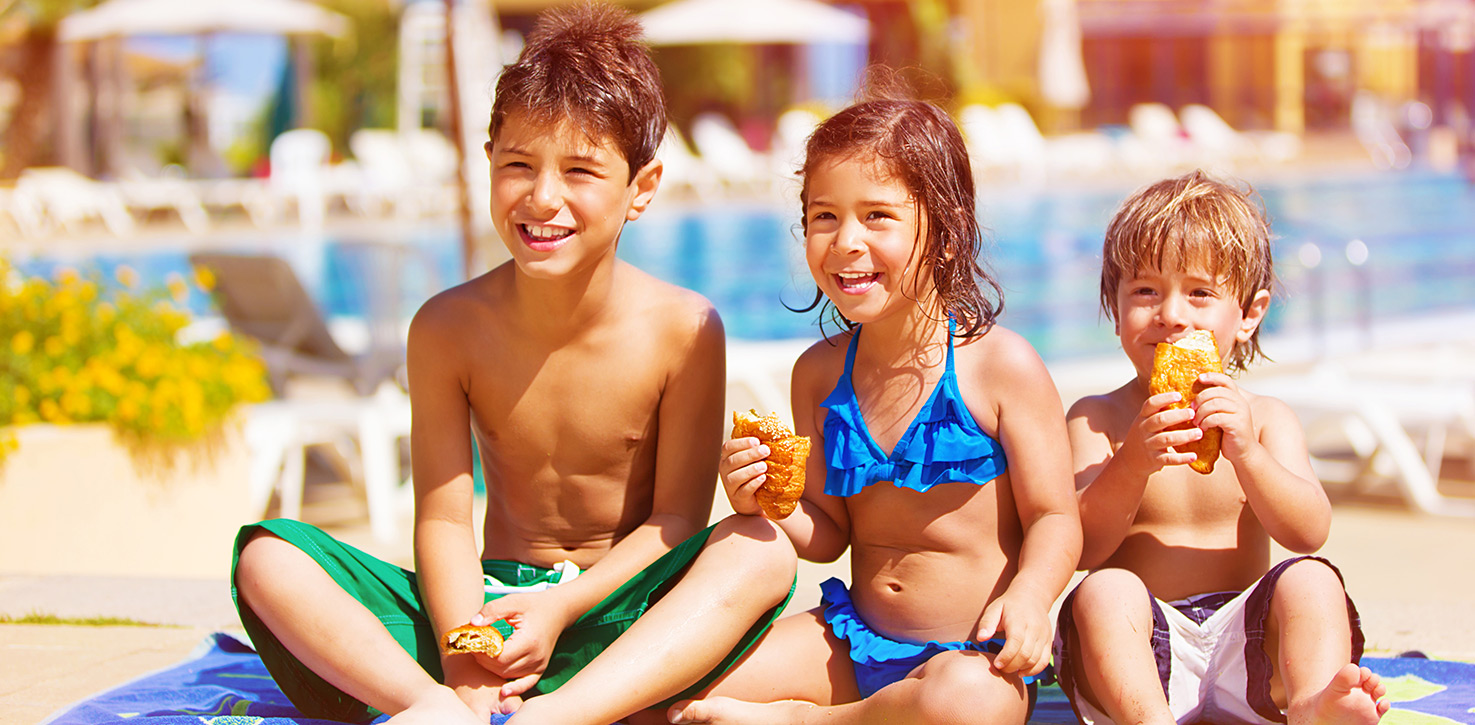 Kids at resort pool